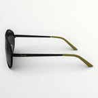 Sunglasses with black and green frame on a white background