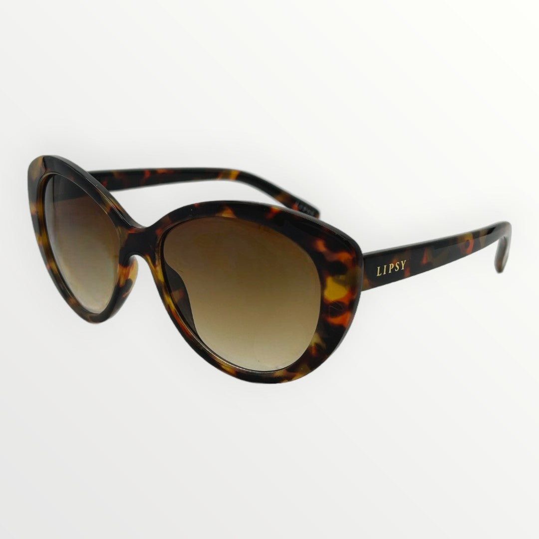 Tortoiseshell sunglasses with brown gradient lenses on a white background