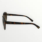 Sunglasses with tortoiseshell frame and 'Lipsy' branding on a white background