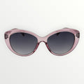 Pink sunglasses with dark lenses on a white background
