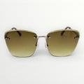 Gold-framed sunglasses with gradient lenses on a white background