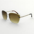 Sunglasses with gold frame and gradient lenses on a white background