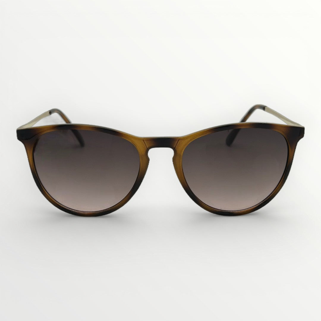Sunglasses with tortoiseshell frame and gradient lenses on a white background