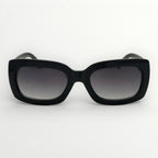 Black sunglasses with gradient lenses on a white background