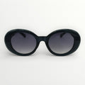 Black sunglasses with gradient lenses on a white background