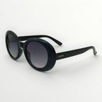 Black sunglasses with gradient lenses on a white background