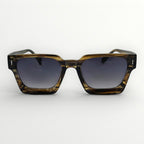 Sunglasses with tortoiseshell frame and dark lenses on a white background