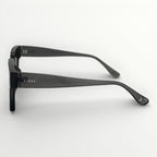 Black eyeglasses with 'Lipsy' branding on a white background