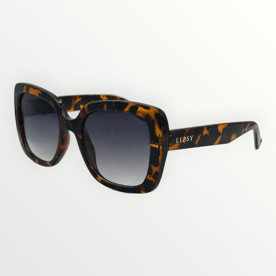 Sunglasses with tortoiseshell frame and gradient lenses on a white background
