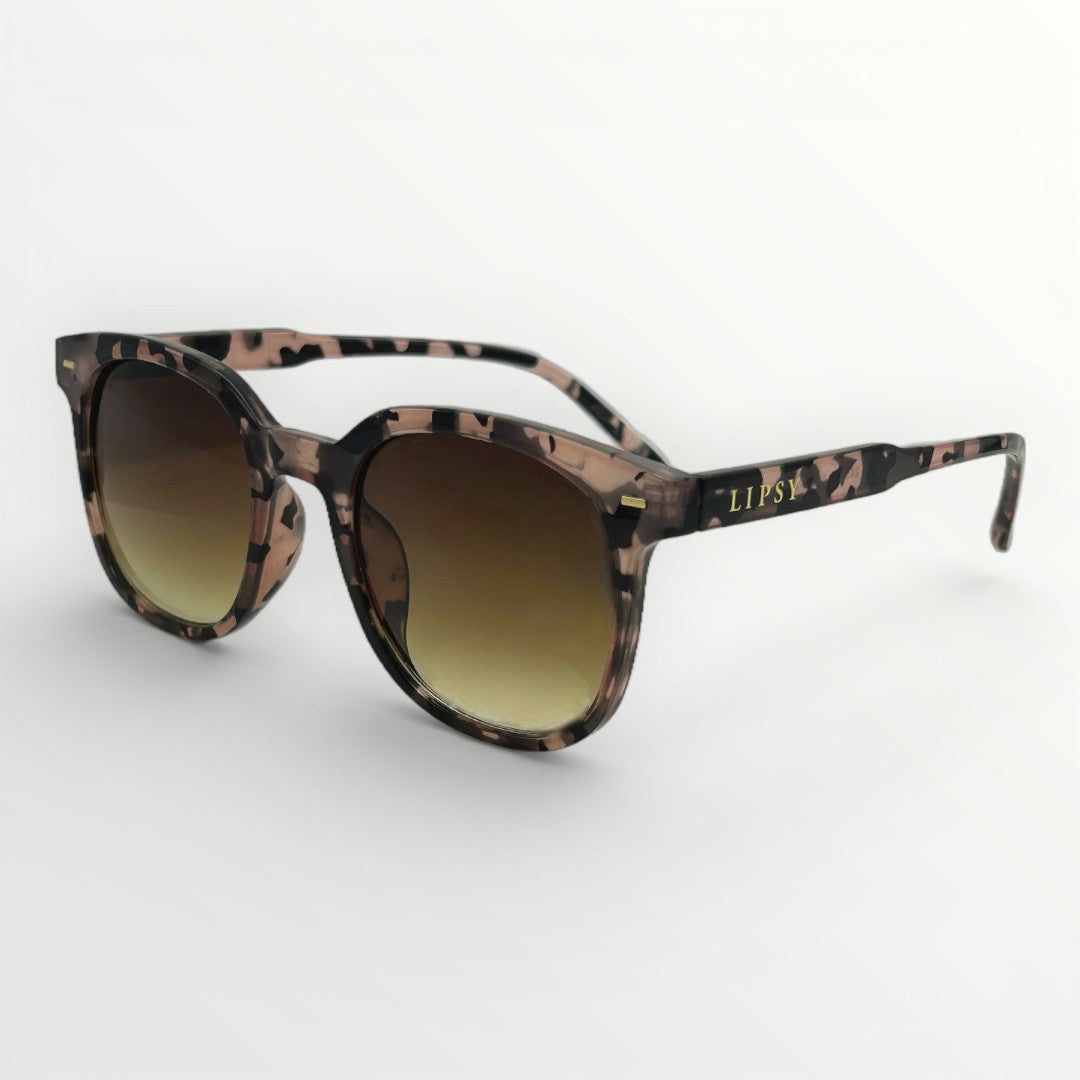 Sunglasses with a patterned frame and gradient lenses on a white background
