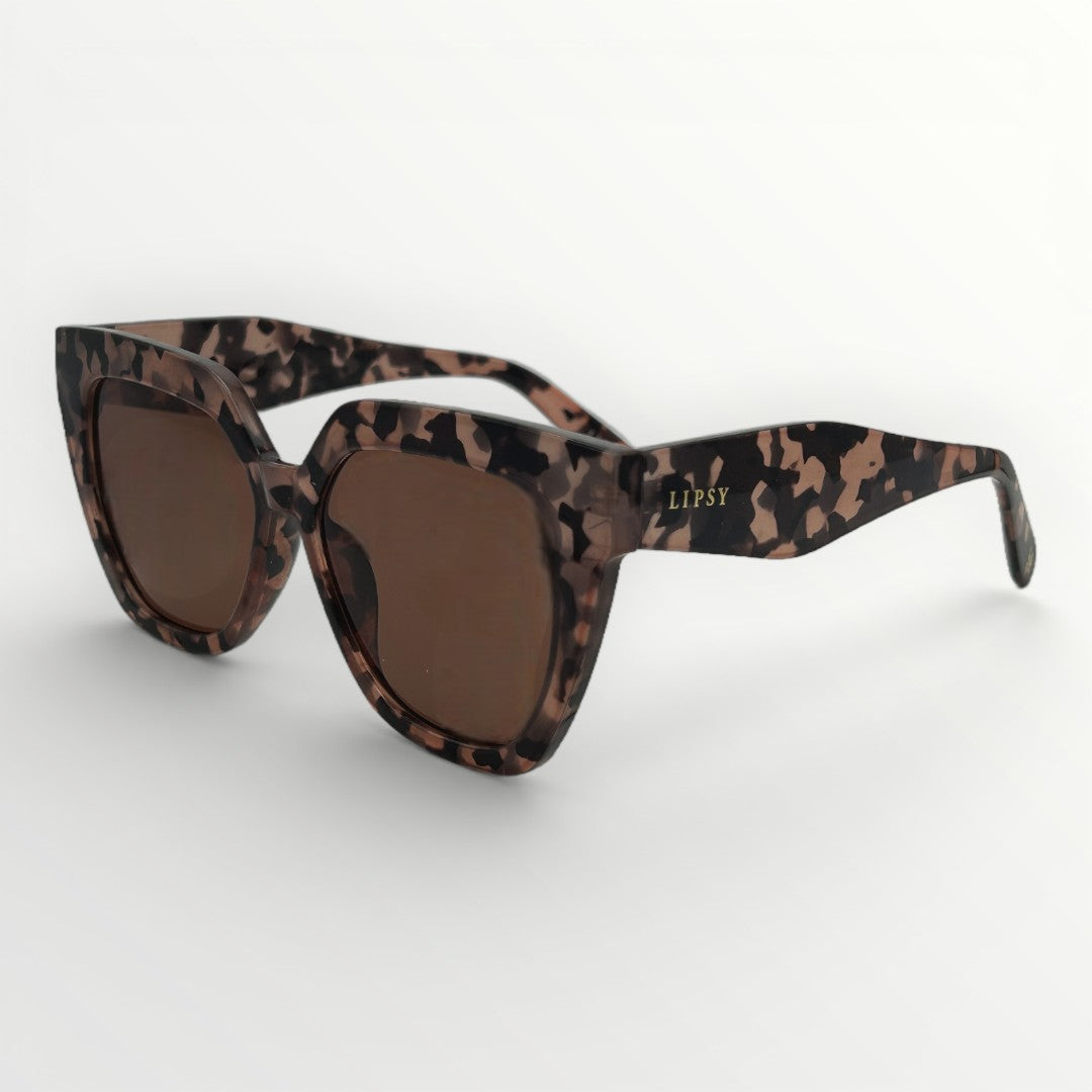 Leopard print sunglasses with brown lenses on a white background
