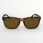 Sunglasses with tortoiseshell frame and brown lenses on a white background