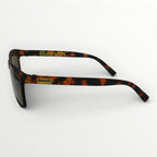 Sunglasses with tortoiseshell frame and 'Bench' logo on a white background