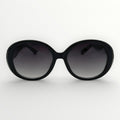 Black sunglasses with gradient lenses on a white background
