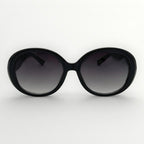 Black sunglasses with gradient lenses on a white background