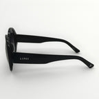 Black sunglasses with 'LIPSY' branding on a white background