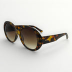 Sunglasses with tortoiseshell frame and gradient lenses on a white background