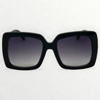 Black sunglasses with gradient lenses on a white background