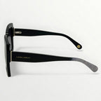 Black sunglasses with 'Laura Ashley' branding on a white background