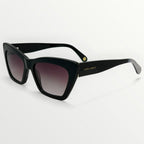 Black sunglasses with gradient lenses on a white background