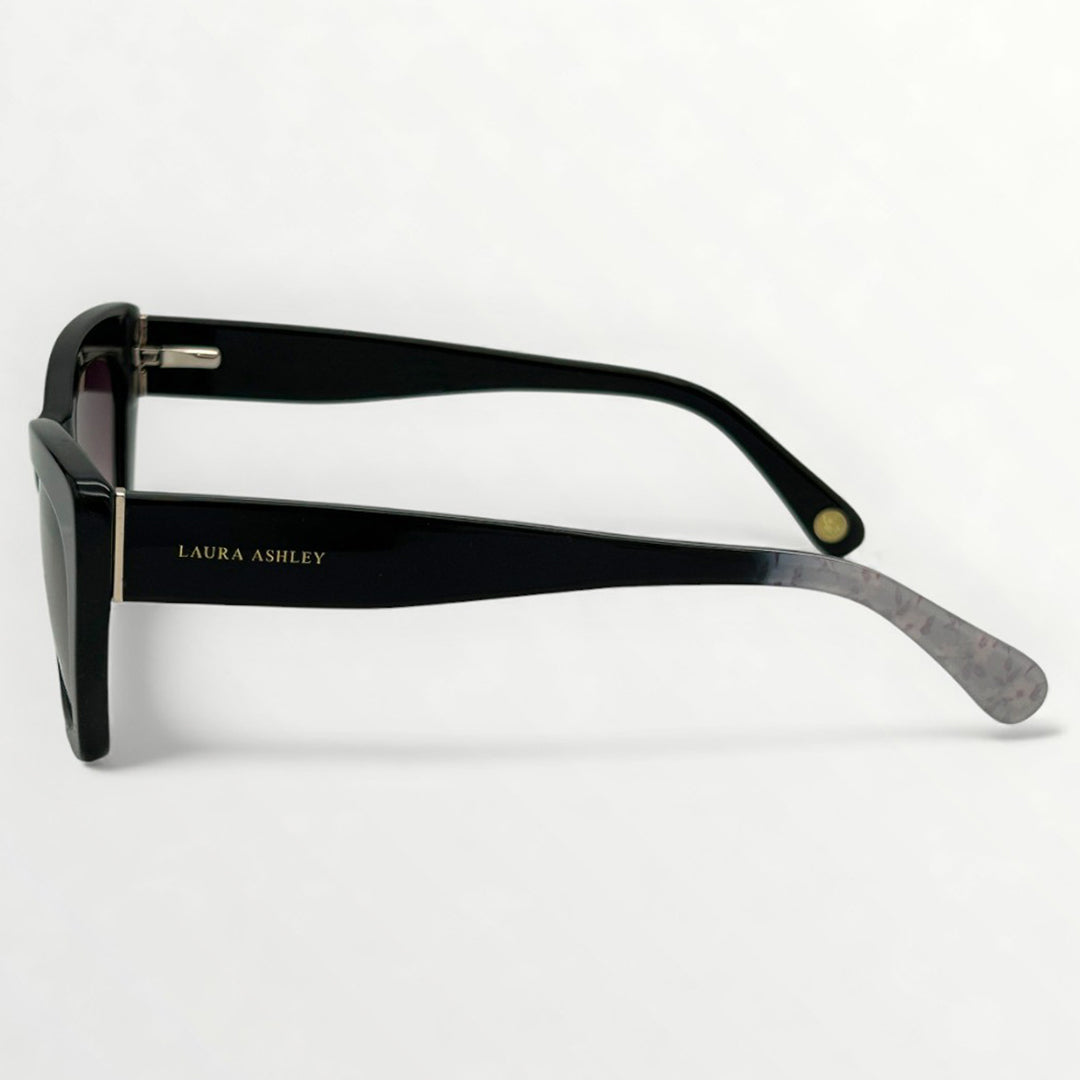 Black sunglasses with 'Laura Ashley' branding on a white background