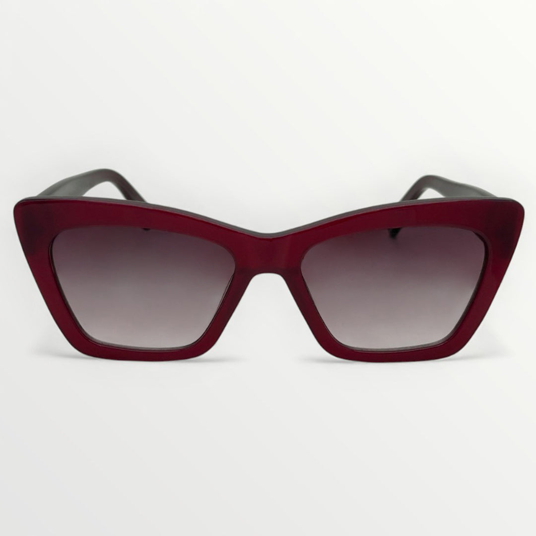 Red sunglasses with a white background