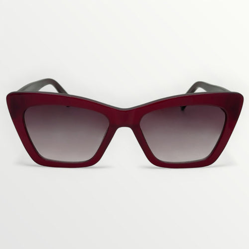 Red sunglasses with a white background