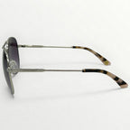 Sunglasses with tortoiseshell arms on a white background