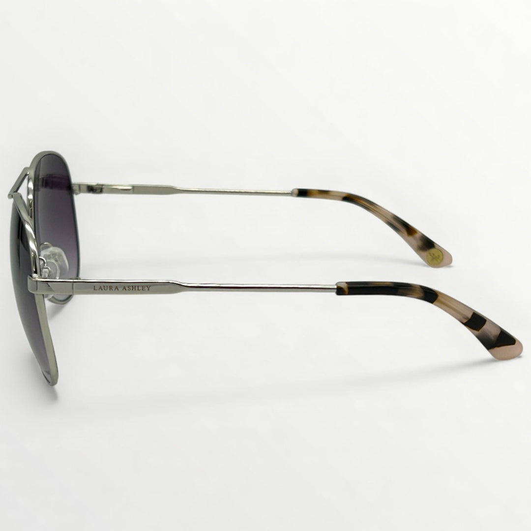 Sunglasses with tortoiseshell arms on a white background