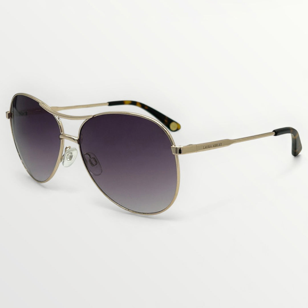 Gold-framed sunglasses with gradient lenses on a white background