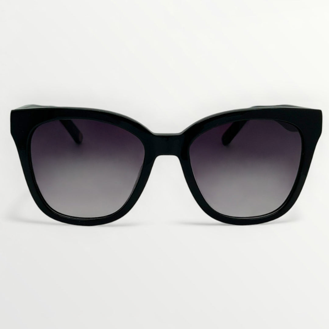 Black sunglasses with gradient lenses on a white background