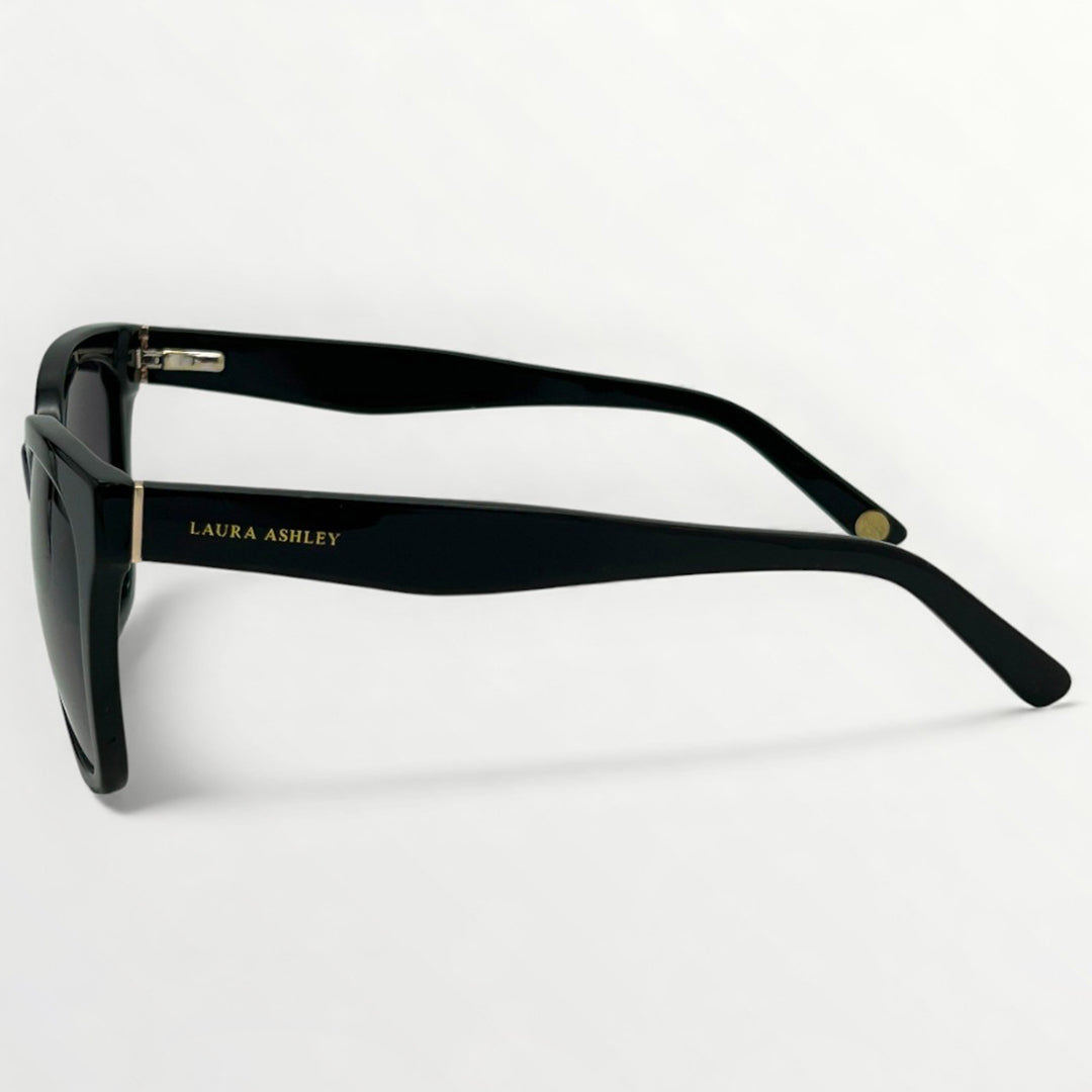 Black sunglasses with 'Laura Ashley' branding on a white background