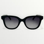 Black sunglasses with gradient lenses on a white background