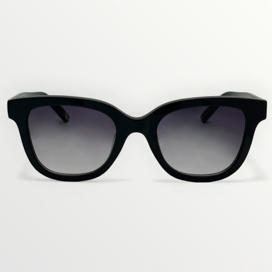 Black sunglasses with gradient lenses on a white background