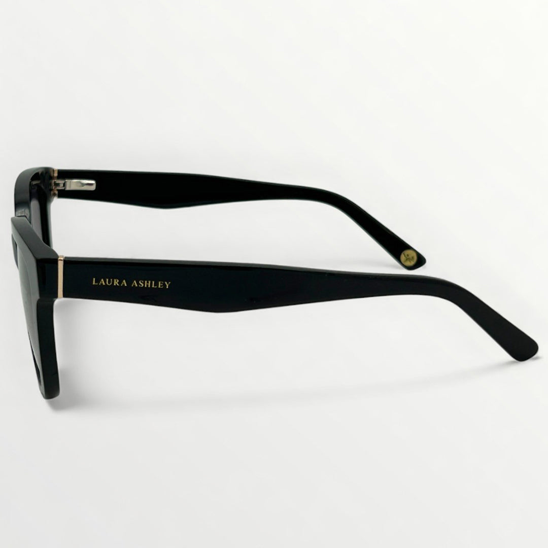 Black glasses with 'Laura Ashley' branding on a white background