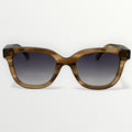 Brown sunglasses with gradient lenses on a white background