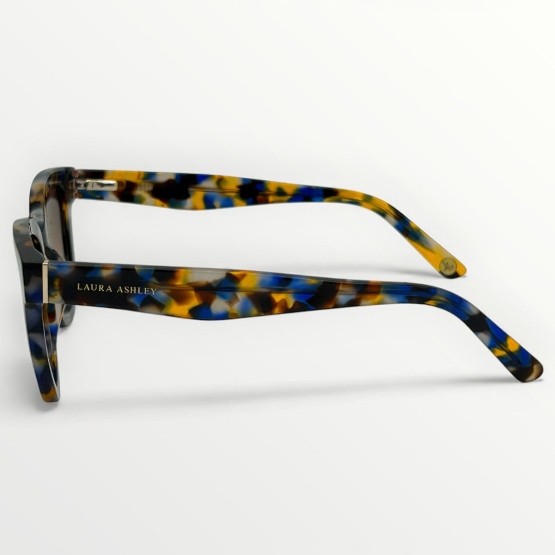 Multicolored tortoiseshell glasses with 'Laura Ashley' branding on a white background