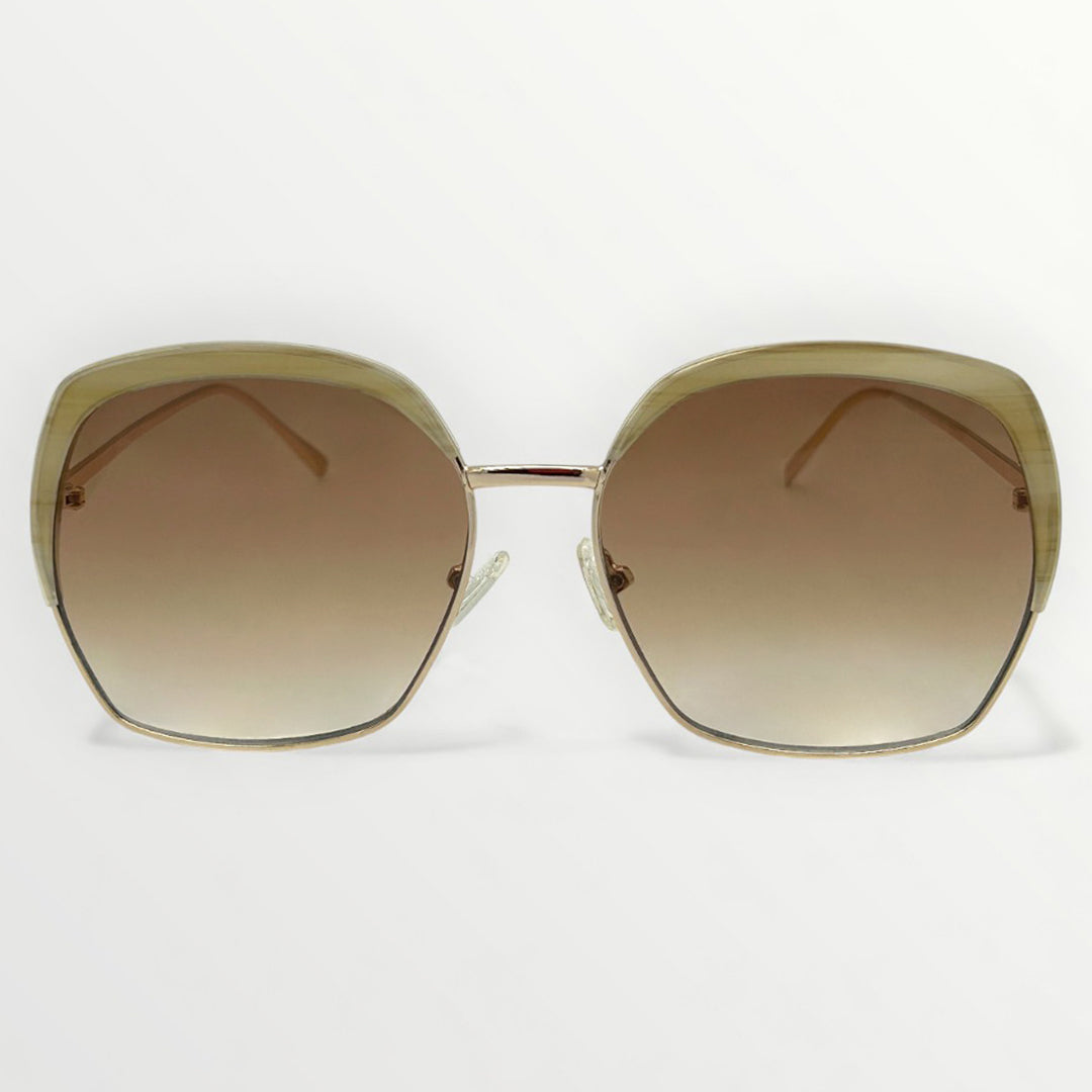 Sunglasses with gold frame and brown gradient lenses on a white background