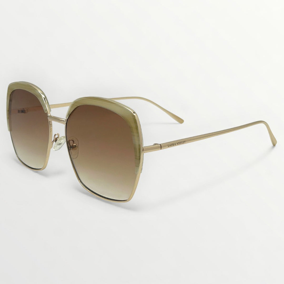 Gold-framed sunglasses with gradient lenses on a white background