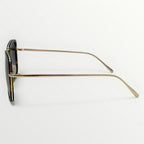 Gold-framed sunglasses on a white background