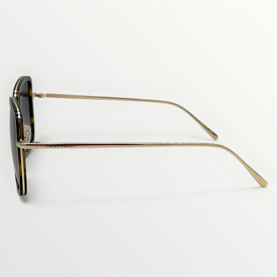 Gold-framed sunglasses on a white background