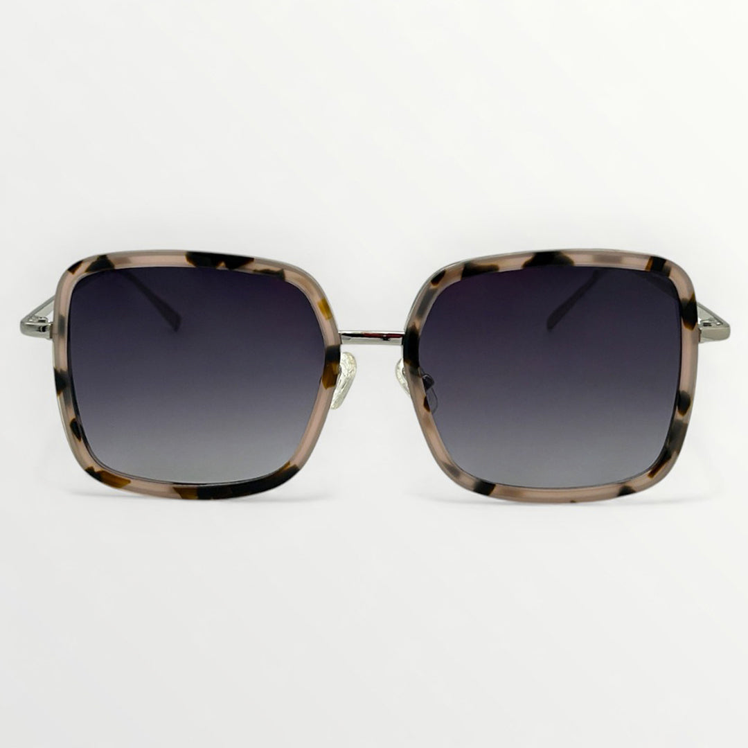 Sunglasses with tortoiseshell frame and dark lenses on a white background