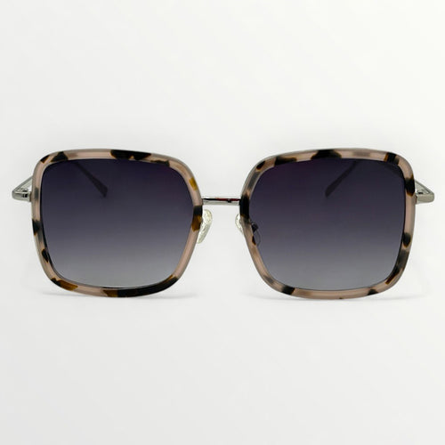 Sunglasses with tortoiseshell frame and dark lenses on a white background