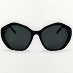 Black sunglasses with dark lenses on a white background