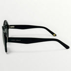 Black sunglasses with 'Laura Ashley' branding on a white background