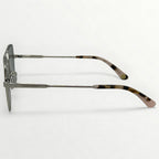 Eyeglasses with tortoiseshell accents on a white background