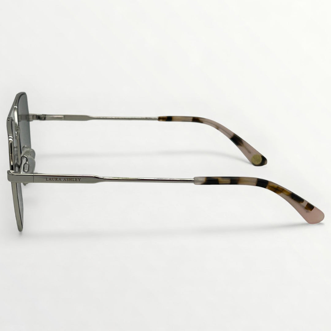 Eyeglasses with tortoiseshell accents on a white background