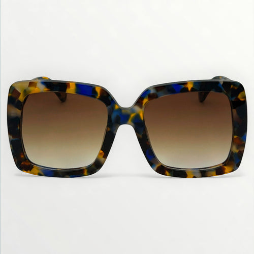 Sunglasses with tortoiseshell frame and brown gradient lenses on a white background