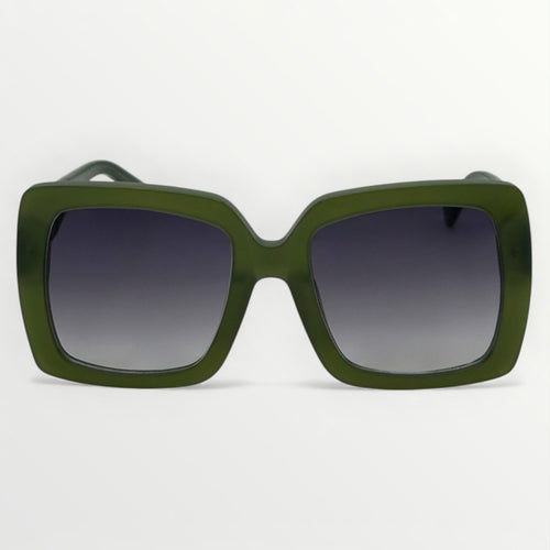 Green sunglasses with dark lenses on a light gray background