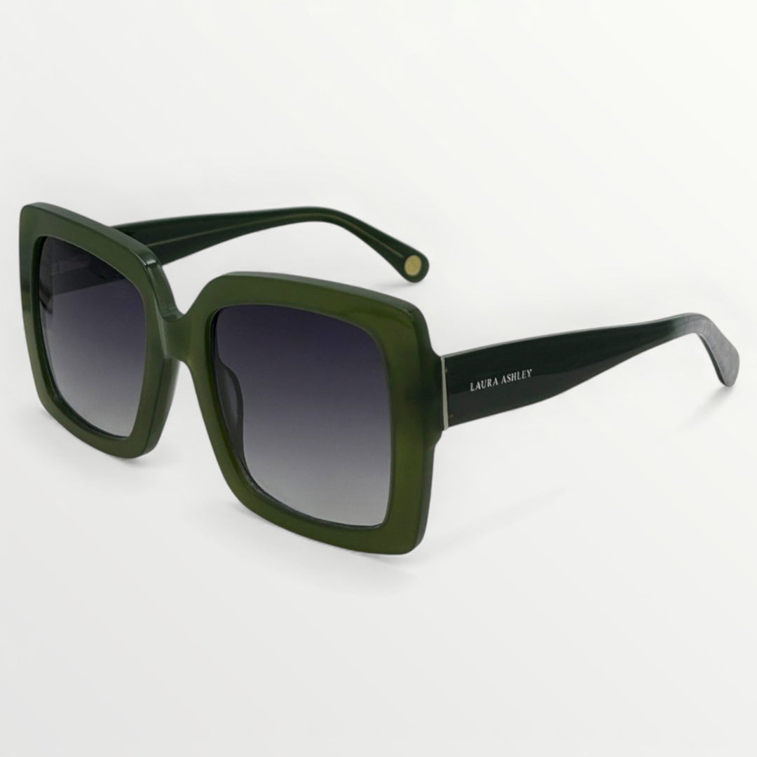 Green sunglasses with a gradient lens on a white background